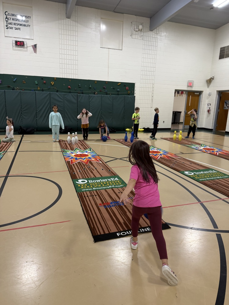 students bowling in PE