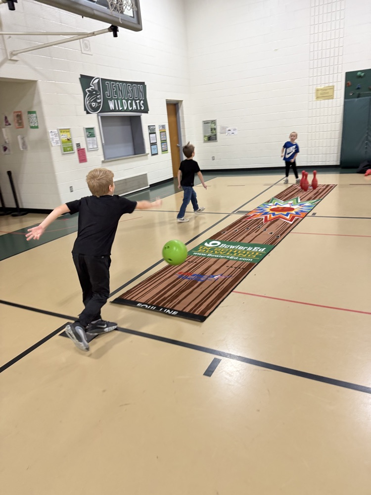 students bowling in PE