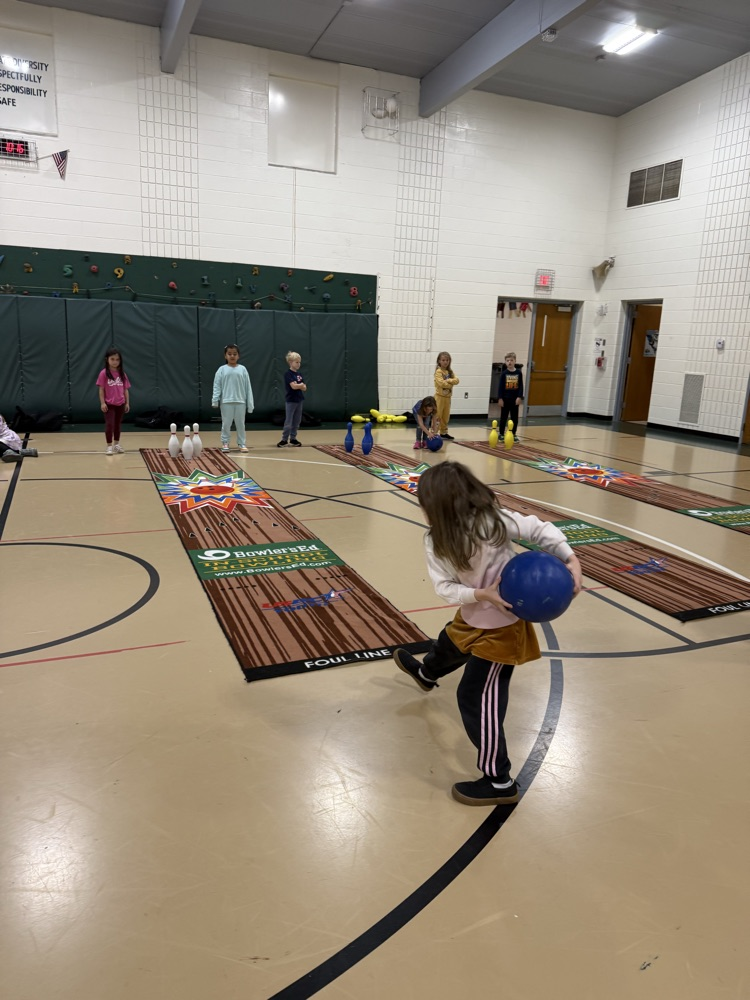 students bowling in PE