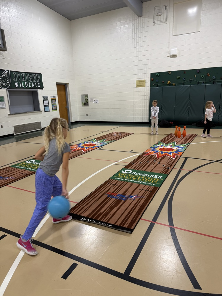 students bowling in PE