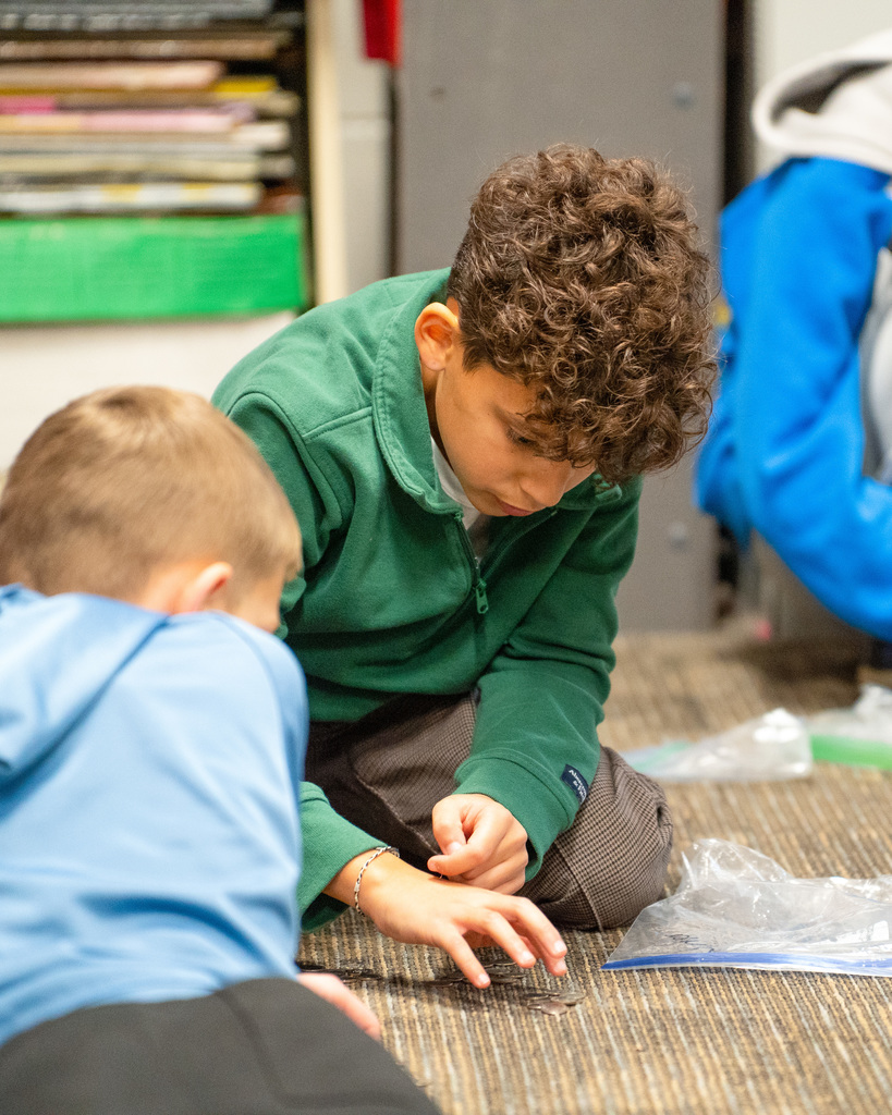 Students collecting change