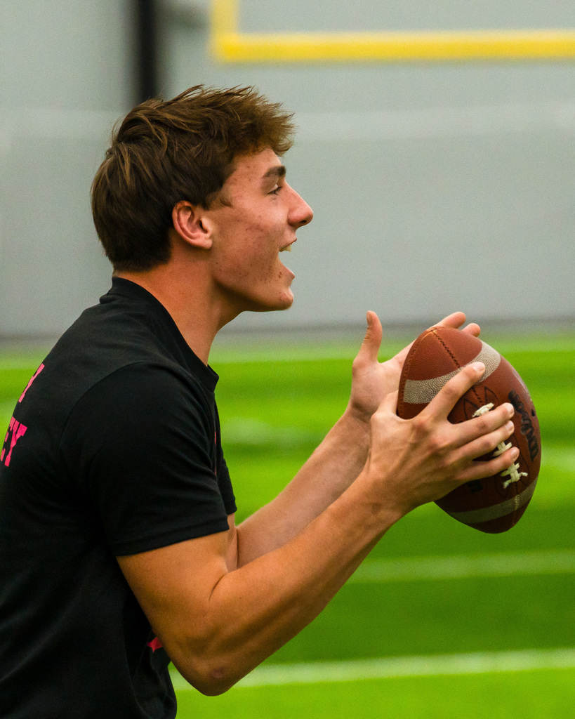 Powder puff players playing football