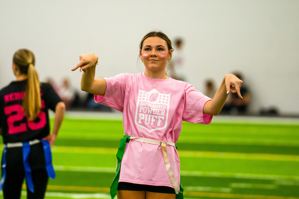 Powder puff players playing football