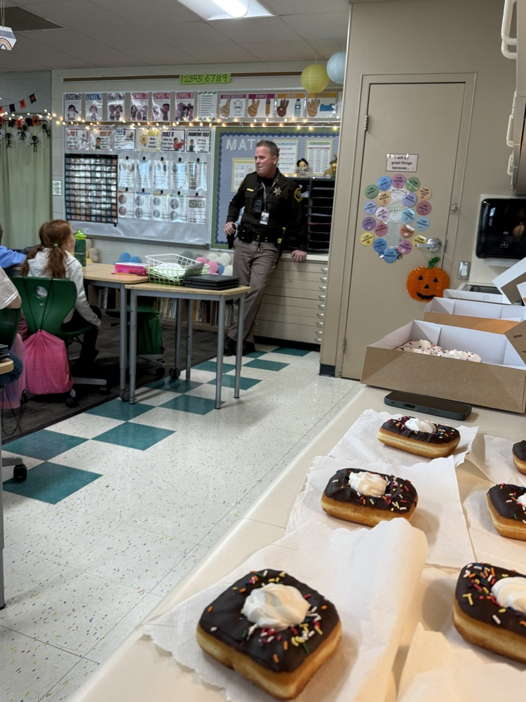 students talking to deputy 
