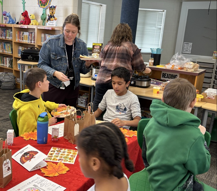 staff helping serving students