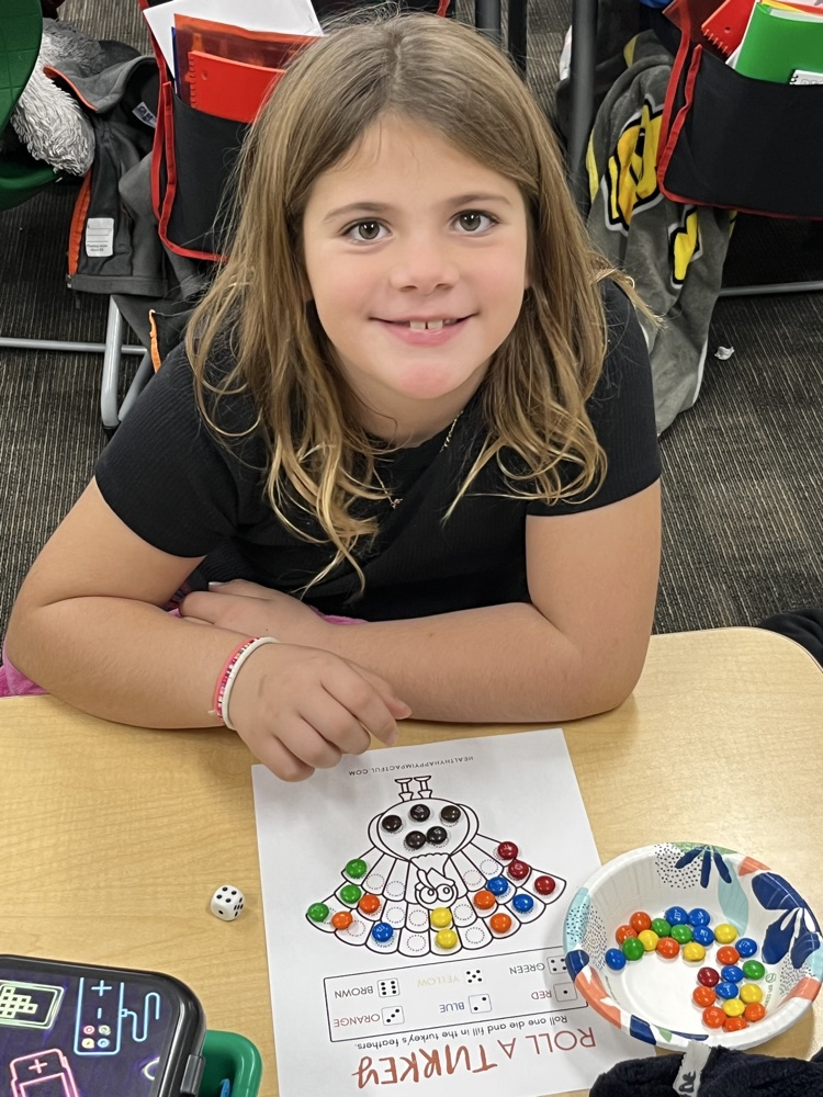 student doing turkey activity 