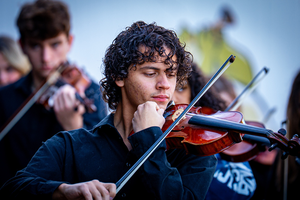 Orchestra students warming up