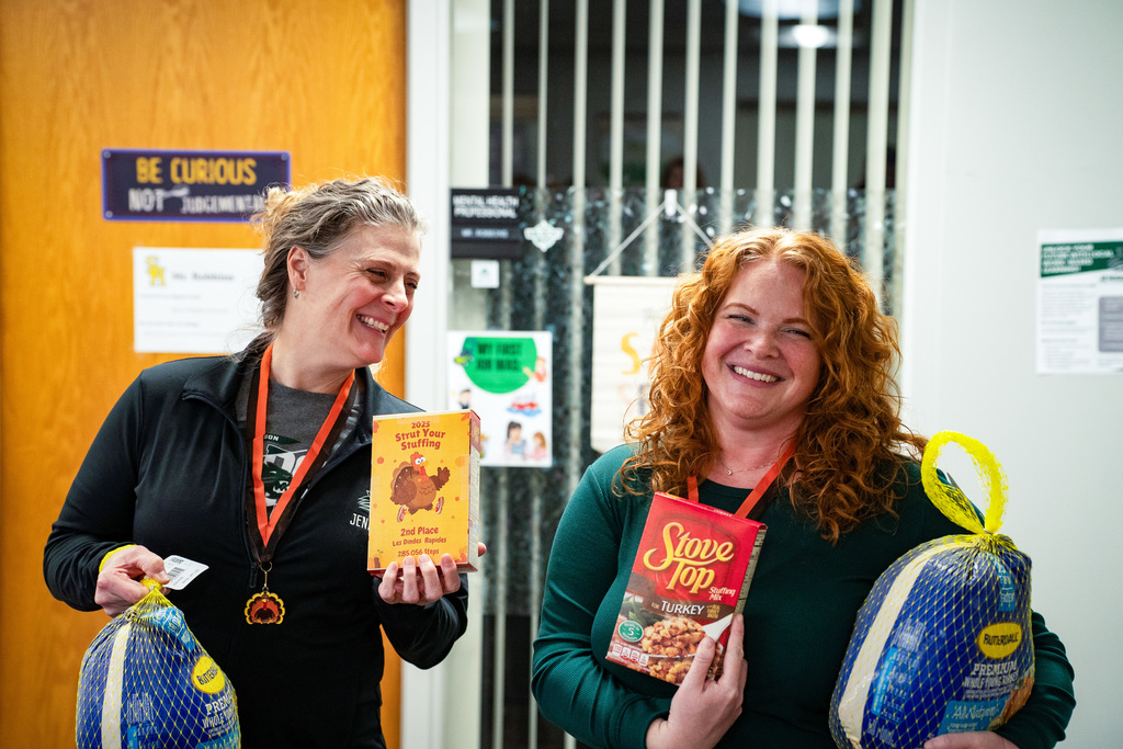 Staff celebrating Winning Wildcat and Strut Your Stuffing