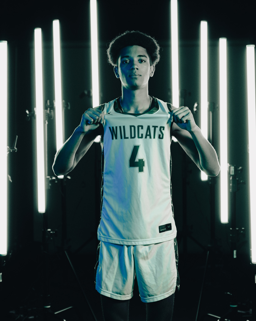 Boys basketball team posing