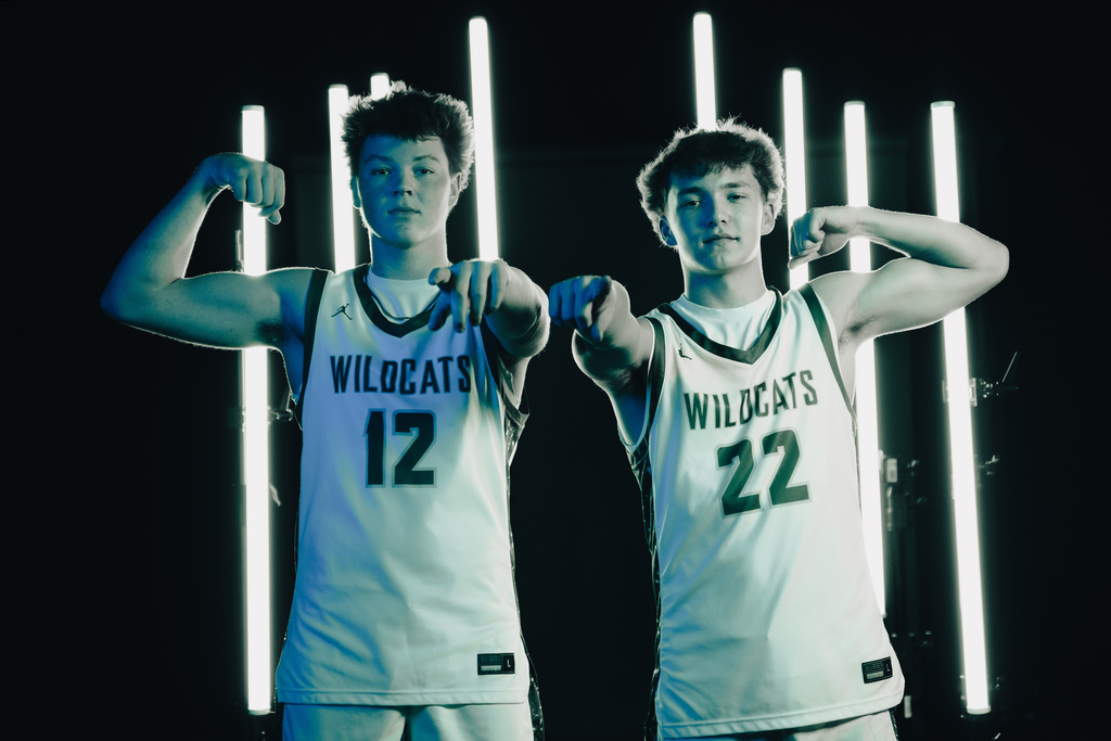 Boys basketball team posing