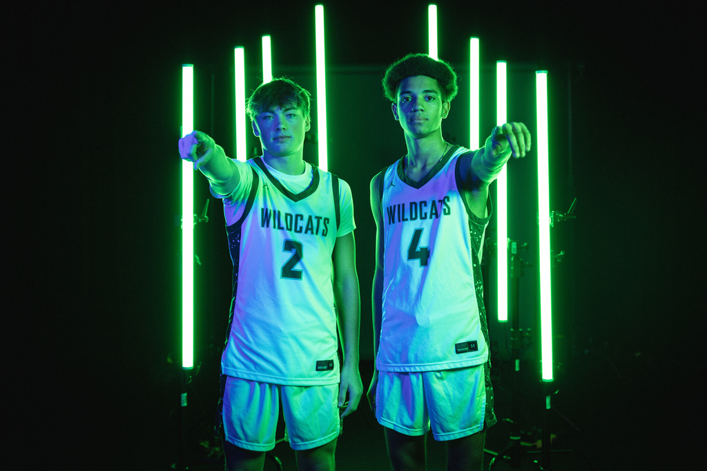 Boys basketball team posing