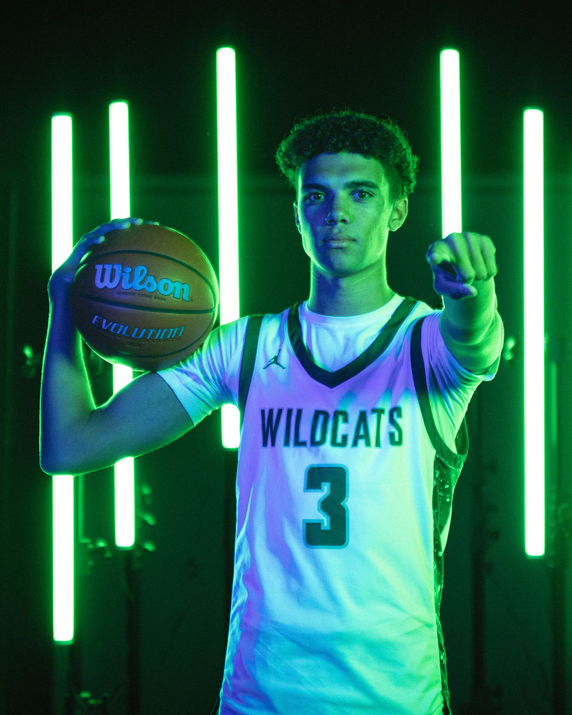 Boys basketball team posing