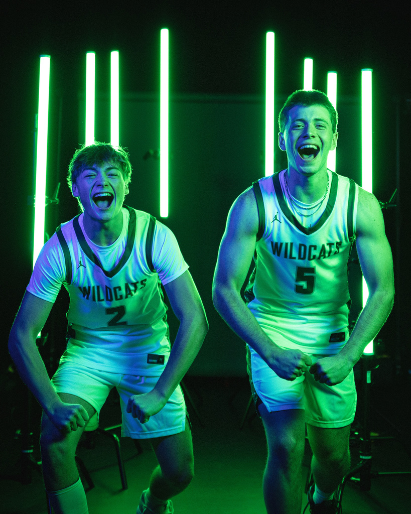 Boys basketball team posing