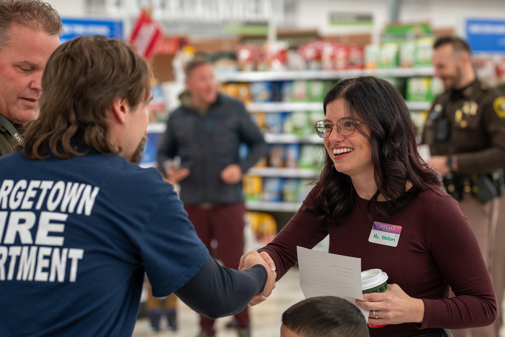 Shop with a Hero volunteers shopping at Meijer