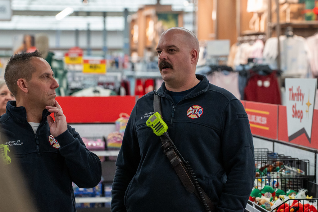 Shop with a Hero volunteers shopping at Meijer