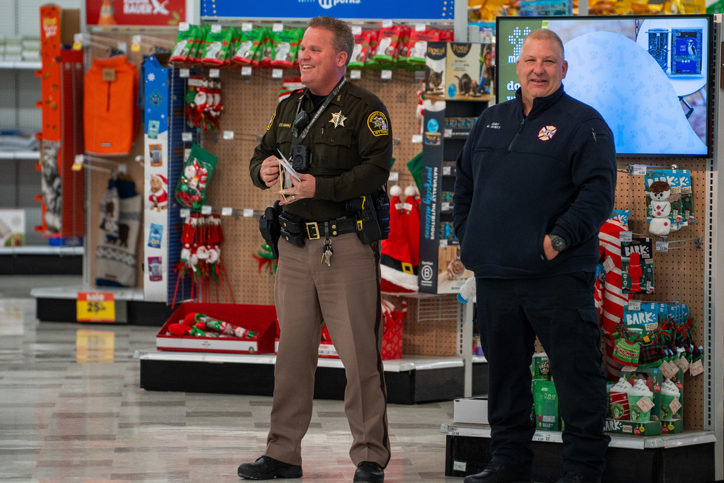 Shop with a Hero volunteers shopping at Meijer