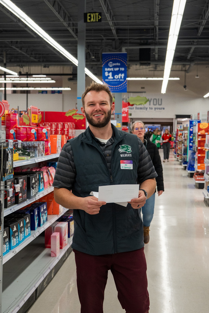 Shop with a Hero volunteers shopping at Meijer