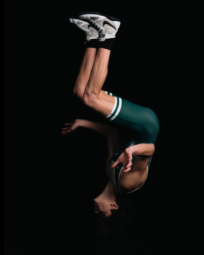 Wrestling team member flipping