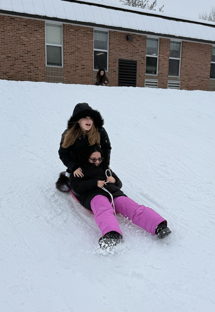 students sledding