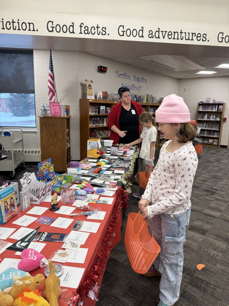 student shopping at holiday gift shop 