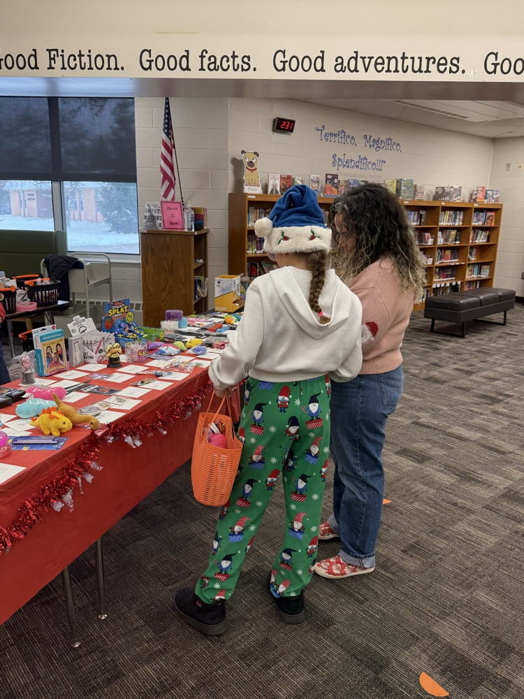 student shopping at holiday gift shop 