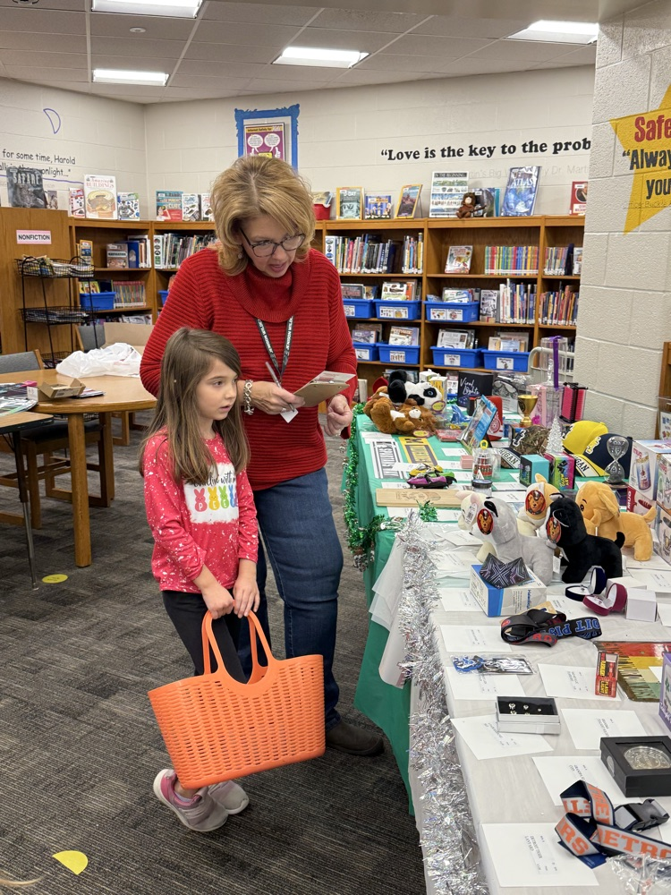 student shopping at holiday gift shop 