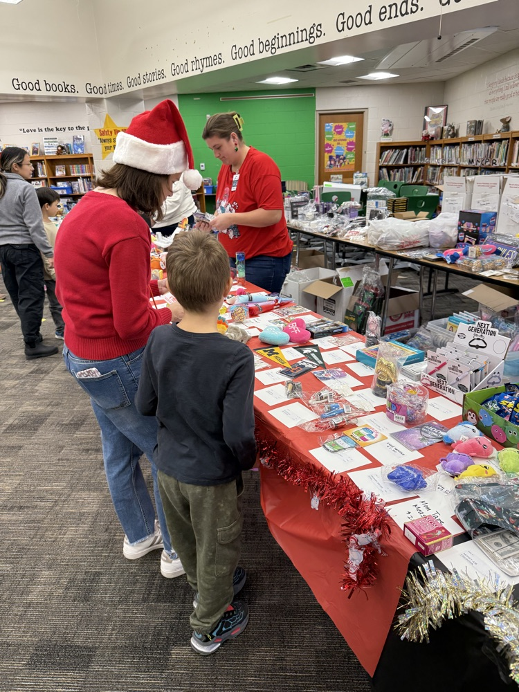 student shopping at holiday gift shop 
