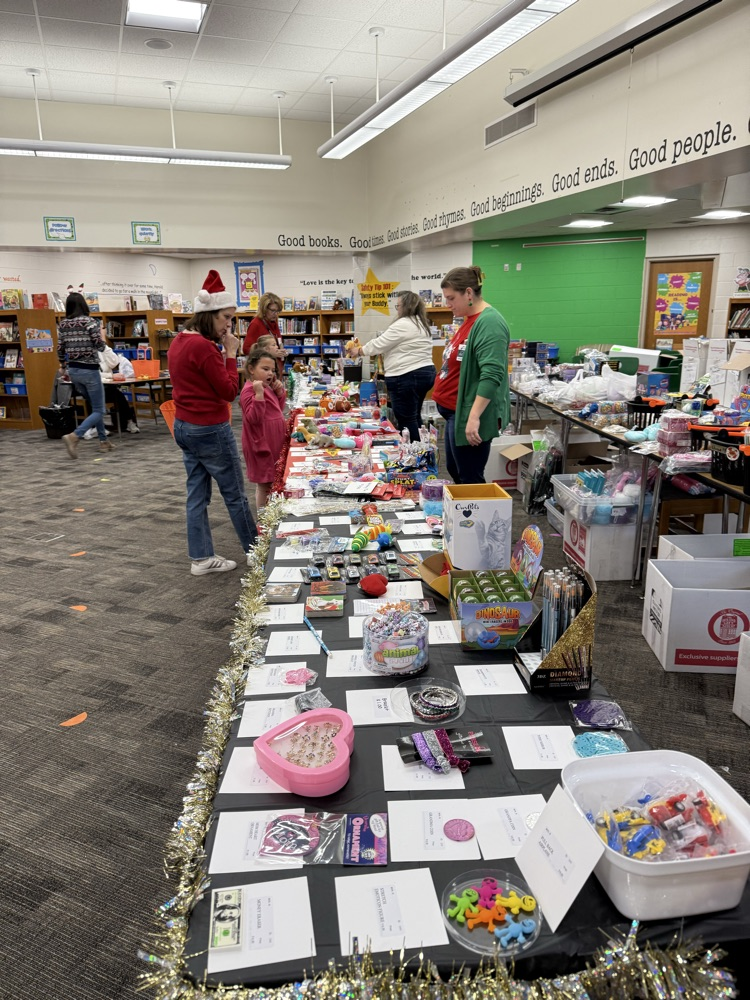 student shopping at holiday gift shop 
