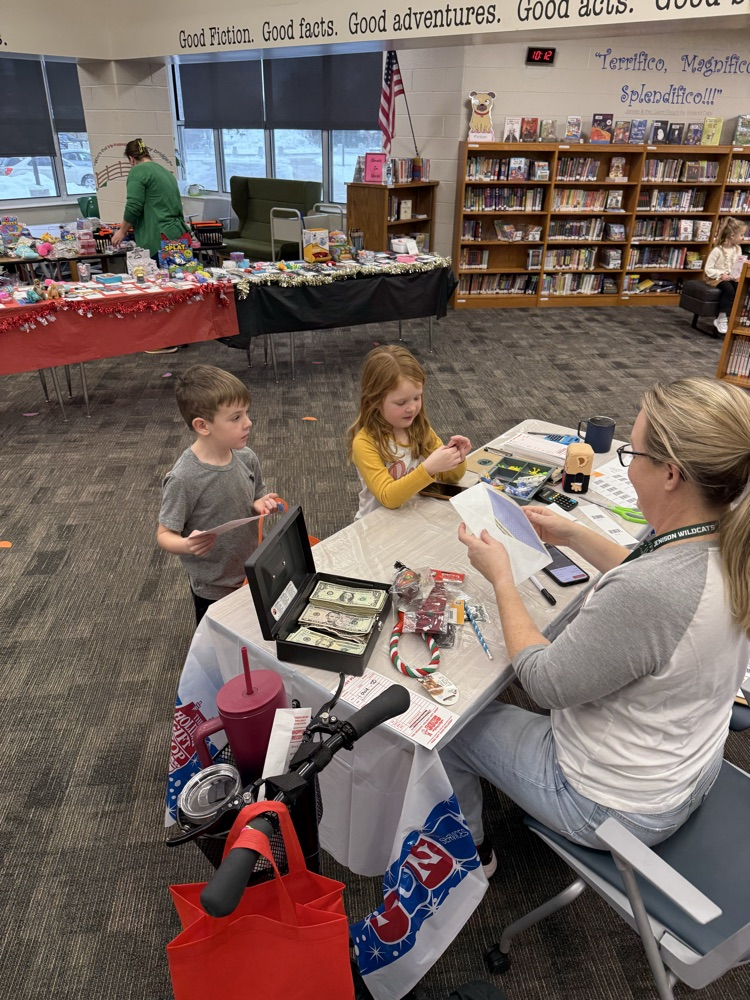 student shopping at holiday gift shop 