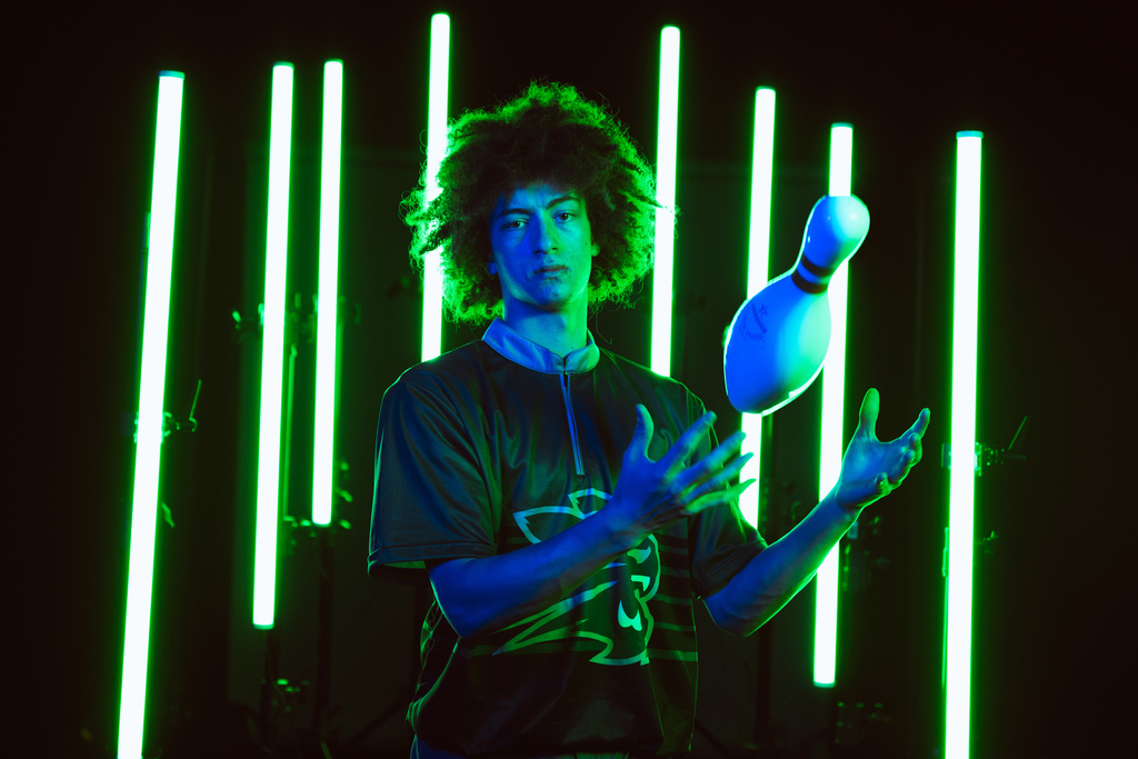Boys bowling team member posing