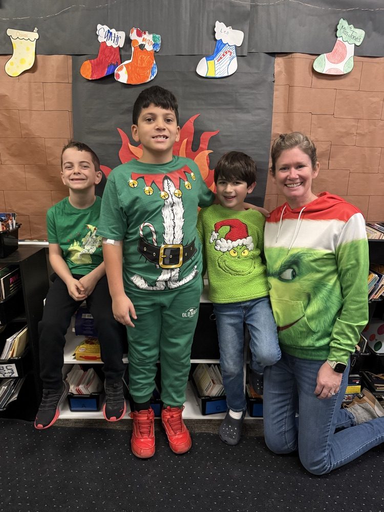 group of students and staff in festive wear