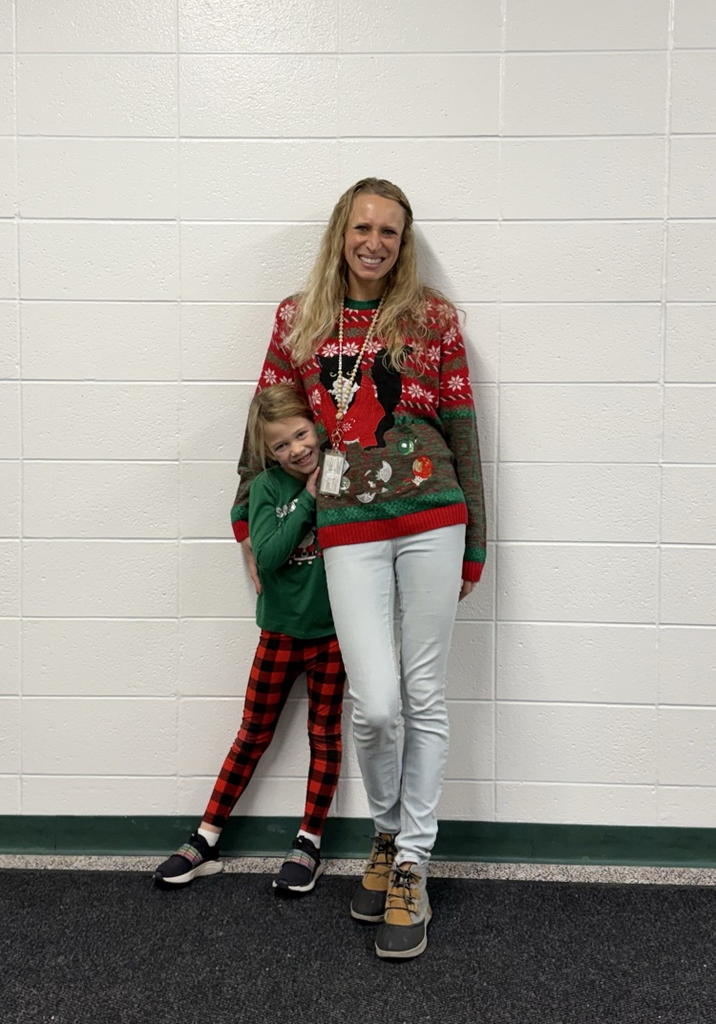 staff and student in festive wear