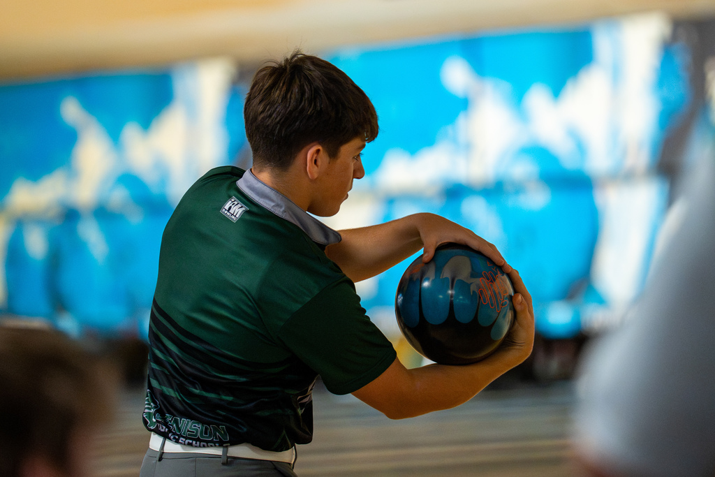 Bowling team member bowling