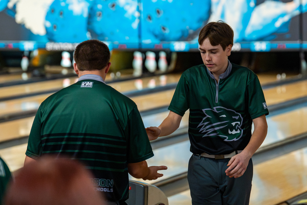 Boys bowling team members celebrating