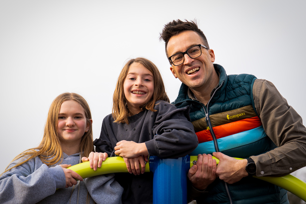 Watch Dog dad smiling with daughter and friend