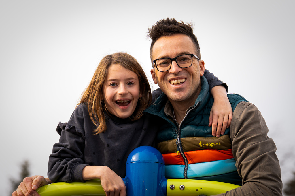 Watch Dog dad smiling with daughter