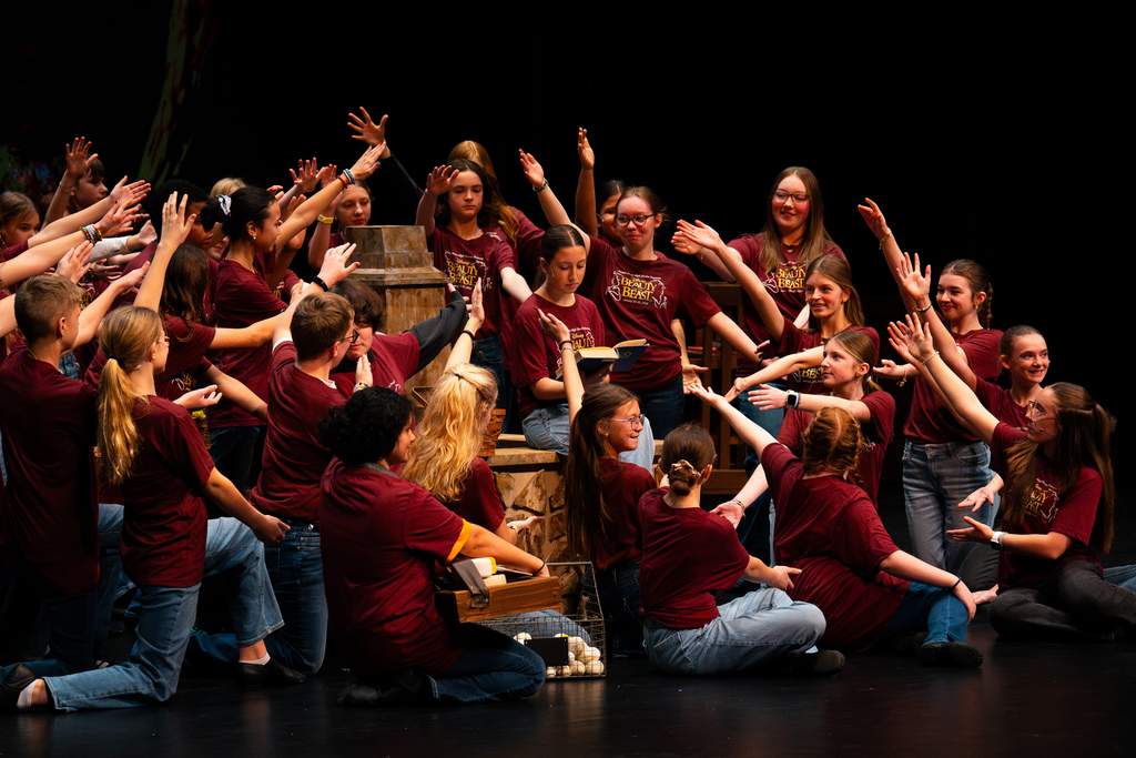 Beauty and the Beast Jr. cast members dancing