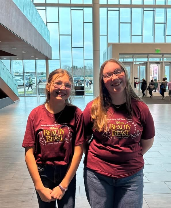 cast greeting students 