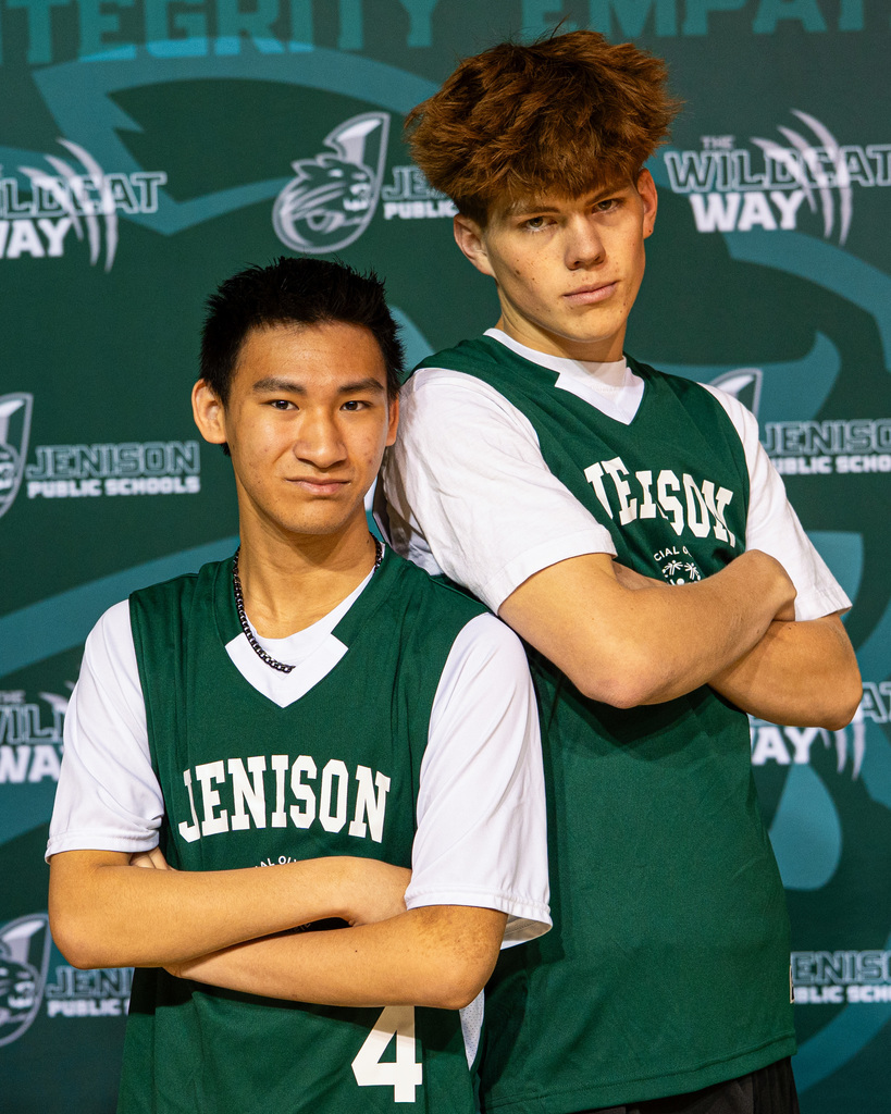 Unified basketball players posing in jerseys