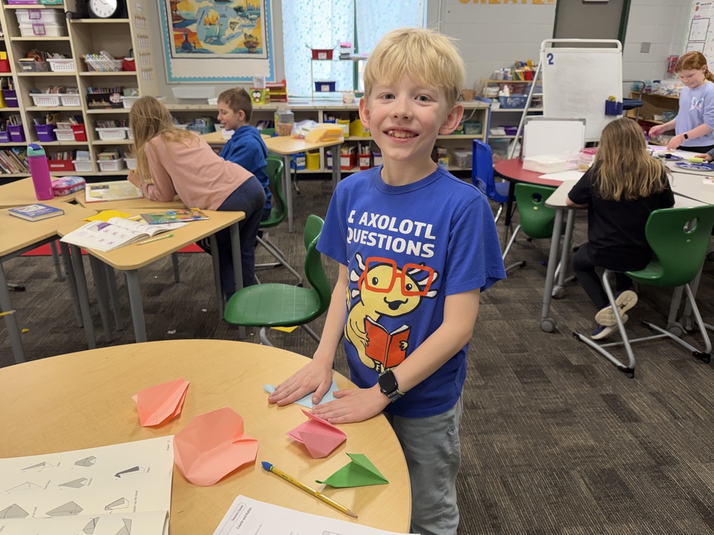 JIA Elementary Students working on a project at school