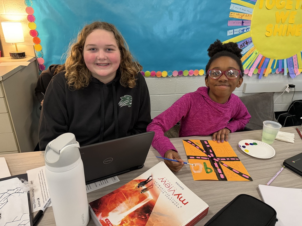 JIA Elementary Students working on a project at school