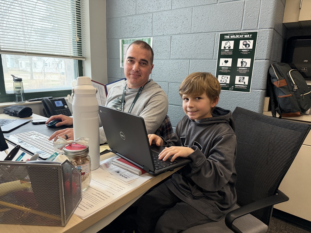 JIA Elementary Students working on a project at school