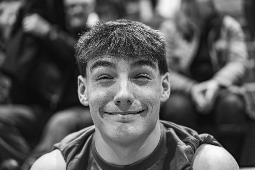 Student smiling with eyes closed