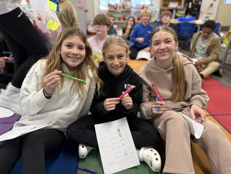students smiling with candy