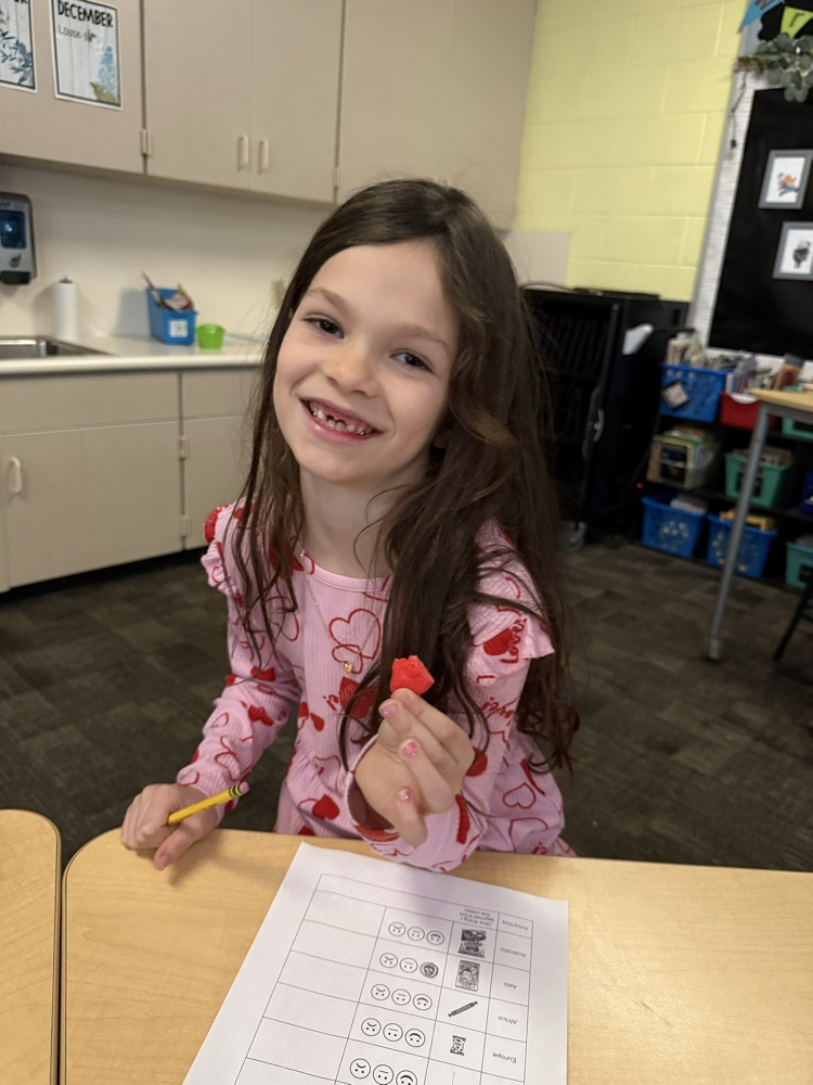 student smiling with candy