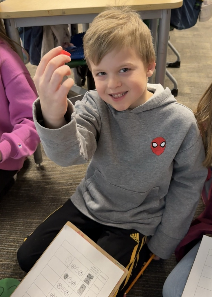 student smiling with candy