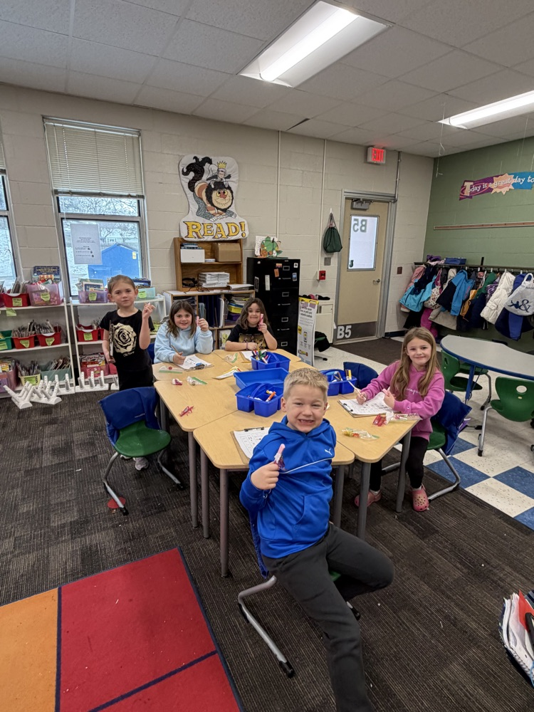 students smiling with candy