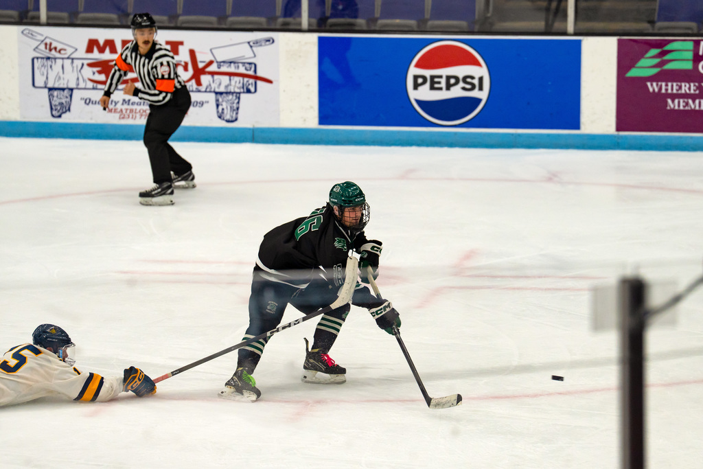 Hockey player shooting