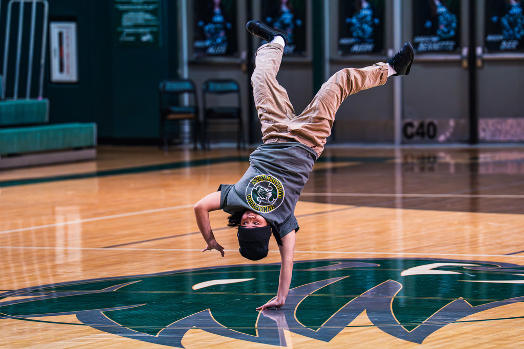 Breakdancing student