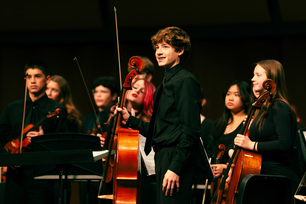 Orchestra students smiling